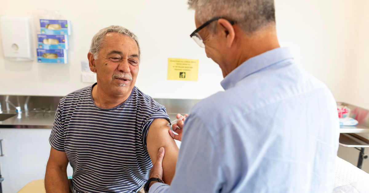 Older man getting a vaccine